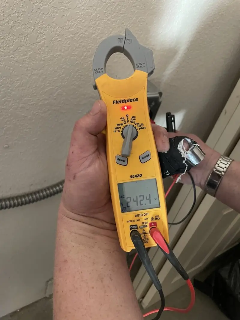 Voltage testing with clamp meter during Circuit Breaker Repair in Tallassee